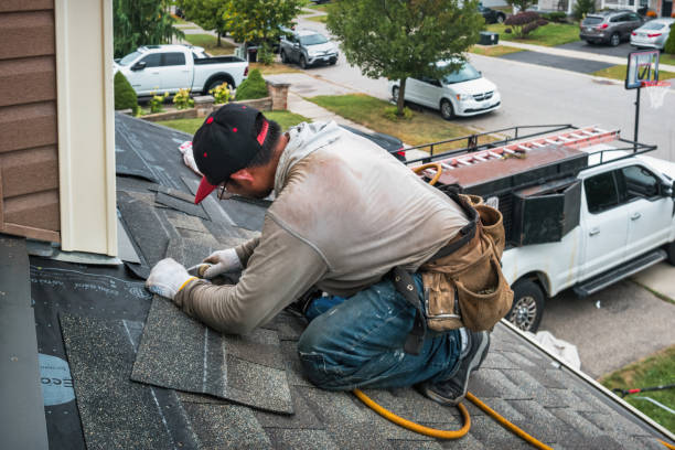 Professional Emergency Roof Repair technician working in Melville, NY